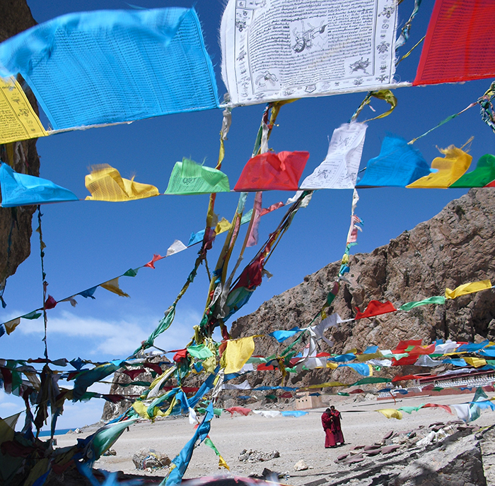 monks prayer flags Tibet